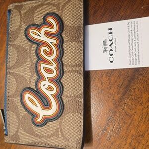 Coach Tan and Black Signature Wallet